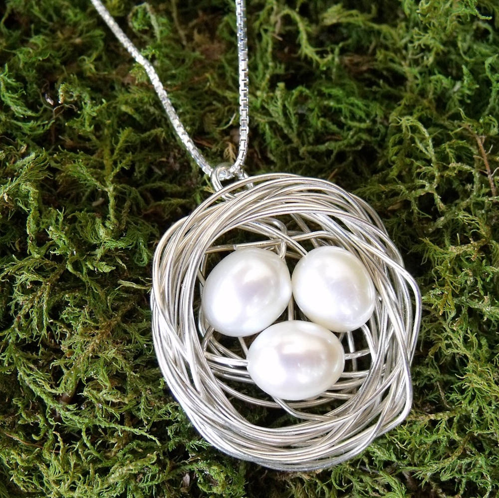 Silver bird nest necklaces